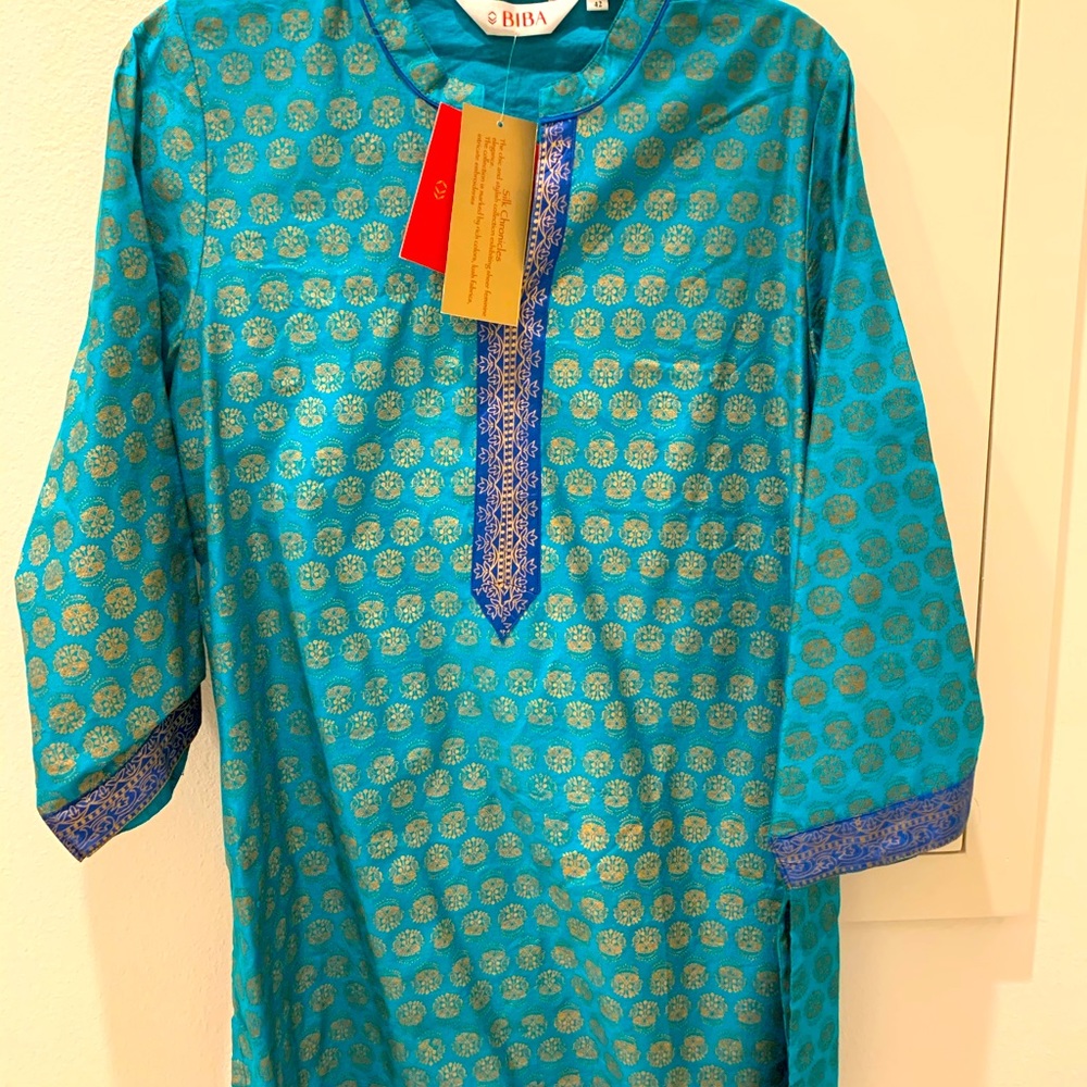 Women’s top with gold block print